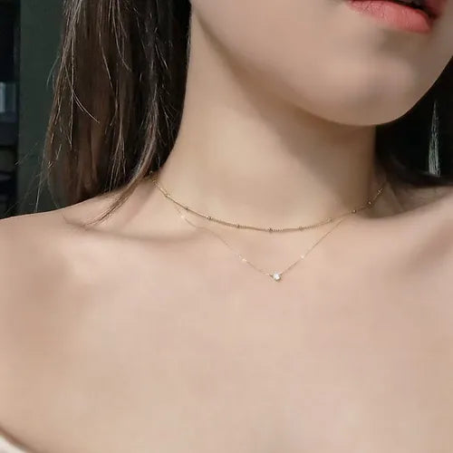 Tiny Diamond Pendant